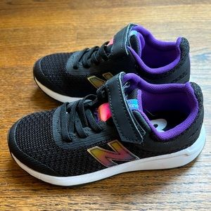 Brand New. Never worn. New Balance kids shoe. Size 11.5